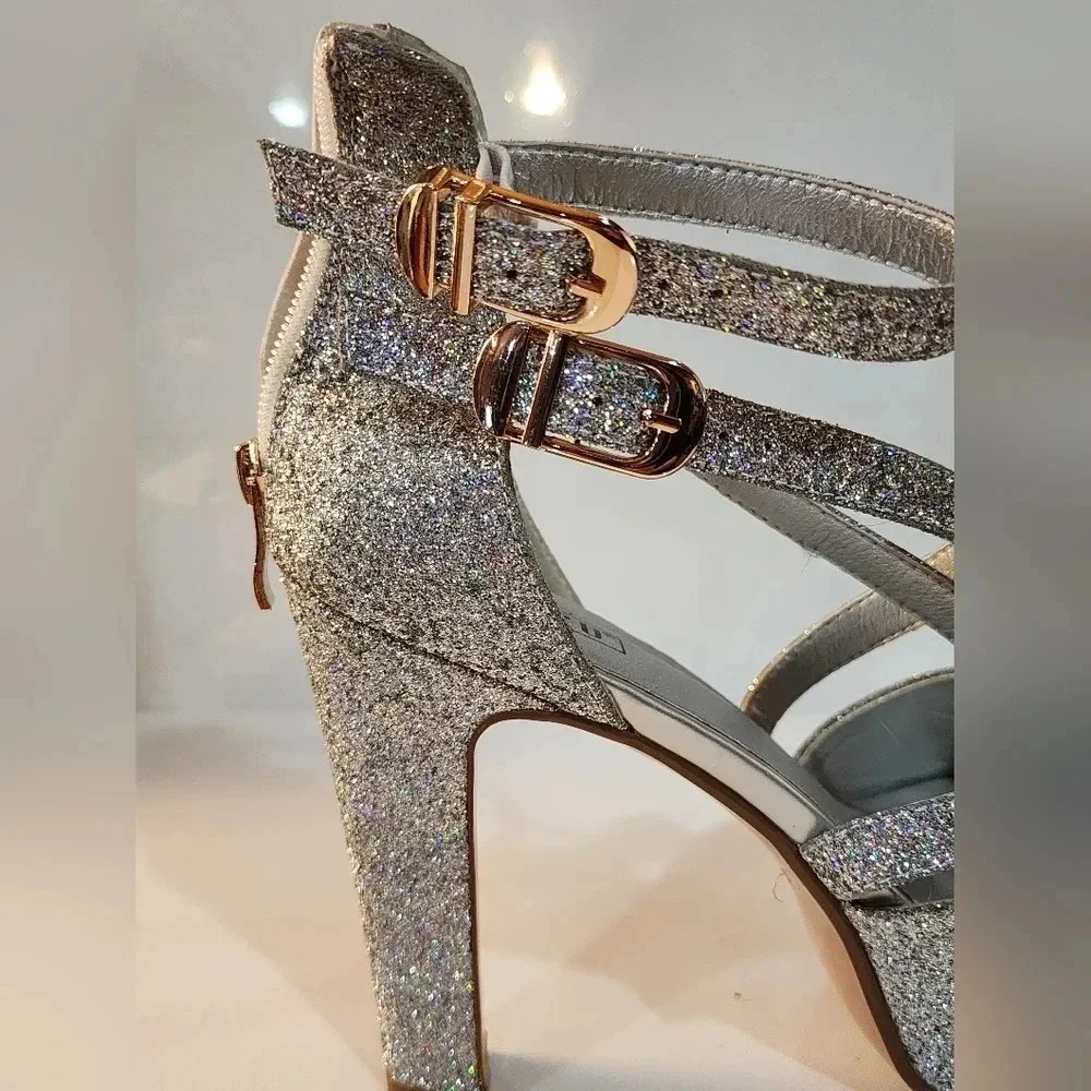 IDIFU silver glitter platform heels with a peep toe design Size 8.5 Like new